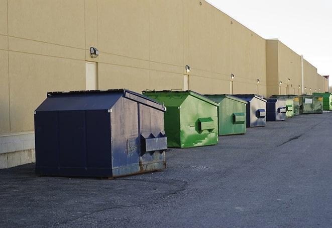 dumpsters with safety cones in a construction area in Babson Park, FL